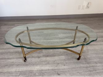 Elegant Glass Coffee Table with Brass Finish Base – 46” x 27” $125