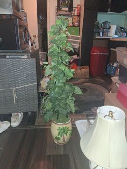 Fake tree with palm tree pot