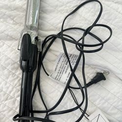 The BaBylissPRO Nano Titanium 1¼” Spring Curling Iron