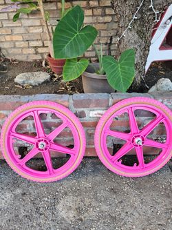 Pink brand new mags and tires bmx