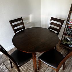 Wooden Dinning Table With 4 Leather Chairs