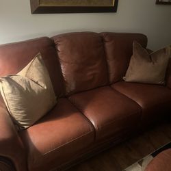 Ready to pickup. Traditional two piece living room set.  Sofa and Loveseat.