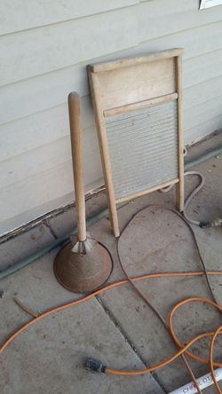 Vintage washboard,and wash plunger