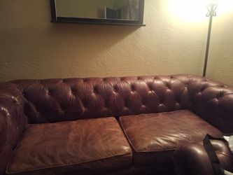 Brown couch have 2