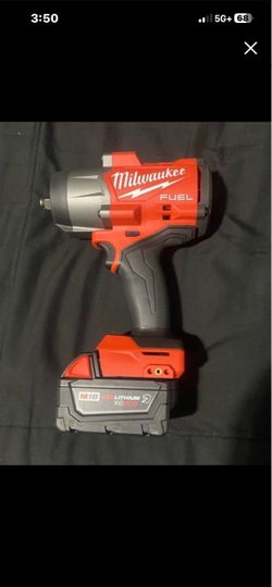 Milwaukee M18 FUEL 18V Lithium Ion Brushless Cordless 1/2 in. Impact Wrench With Friction Ring and XC Resistant 5.0ah Battery