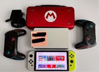 Nintendo Switch OLED Bundle l 7 Hit Games l Aluminum Super Mario Case l 2 Wireless Controllers