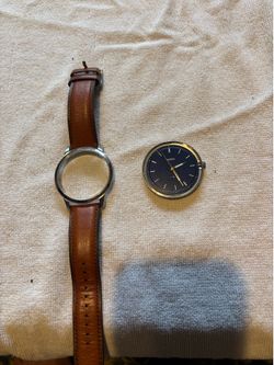 Men watch Fossil
