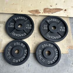 New pair of 35lb iron olympic plates $70