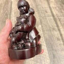 nuit girl and husky in perfect condition.  without chips and cracks, the sculpture is heavy.