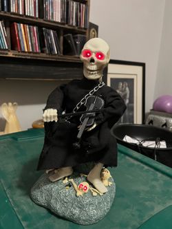 Grim Reaper playing violin