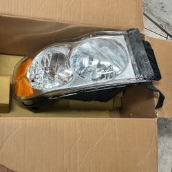 Dodge Full Size P/U 02-05 Head Lamp LH,Assembly,Halogen,w/o Bulb And Wiring Harness For Side Marker Lamp,New Body Style