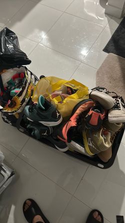 A lot of shoes and hot wheels