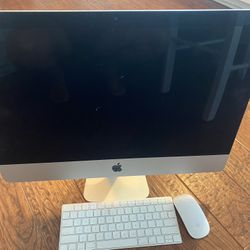 iMac With Wireless Keyboard And Mouse