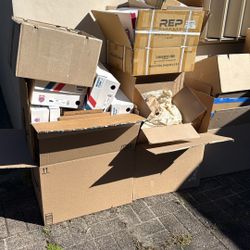 Moving Shipping Boxes With Packing Materials 