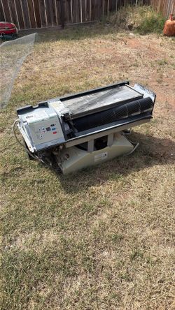 Air conditioner from hotel, ready to use just need to fix the scroll cage