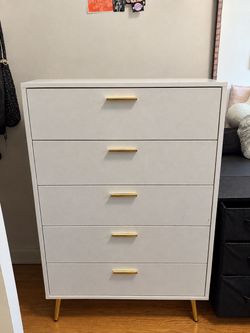 White and gold dresser