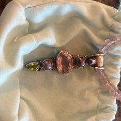 Sterling silver with  pendant and purple Colored beaded necklace silver  with purple and green colors in it