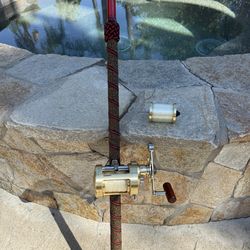 American tackle  8 foot custom wraped rod with a Shimano, Calcutta, 700 Reel with extra Spool.