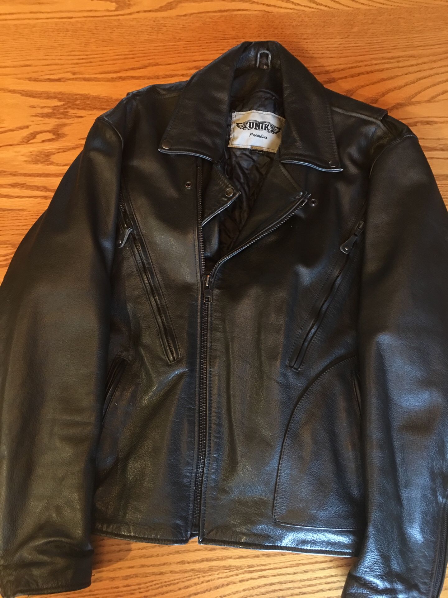 Photo Black leather motorcycle jacket.
