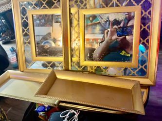 4 pcs Preowned vintage home decor. 2- decorative gold-framed mirrors featuring a unique layered design with an inner square frame and an outer geometr