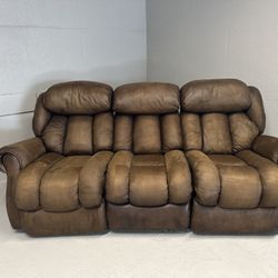 Brown reclining sofa, super comfy delivery available financing available 