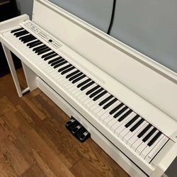 White Korg C1 Digital Piano