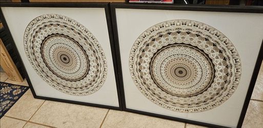 2 mandala type items in picture frames with glass