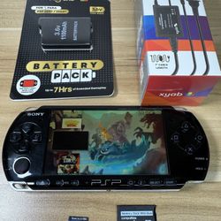 PSP 3000 with 100 games installed                  S74