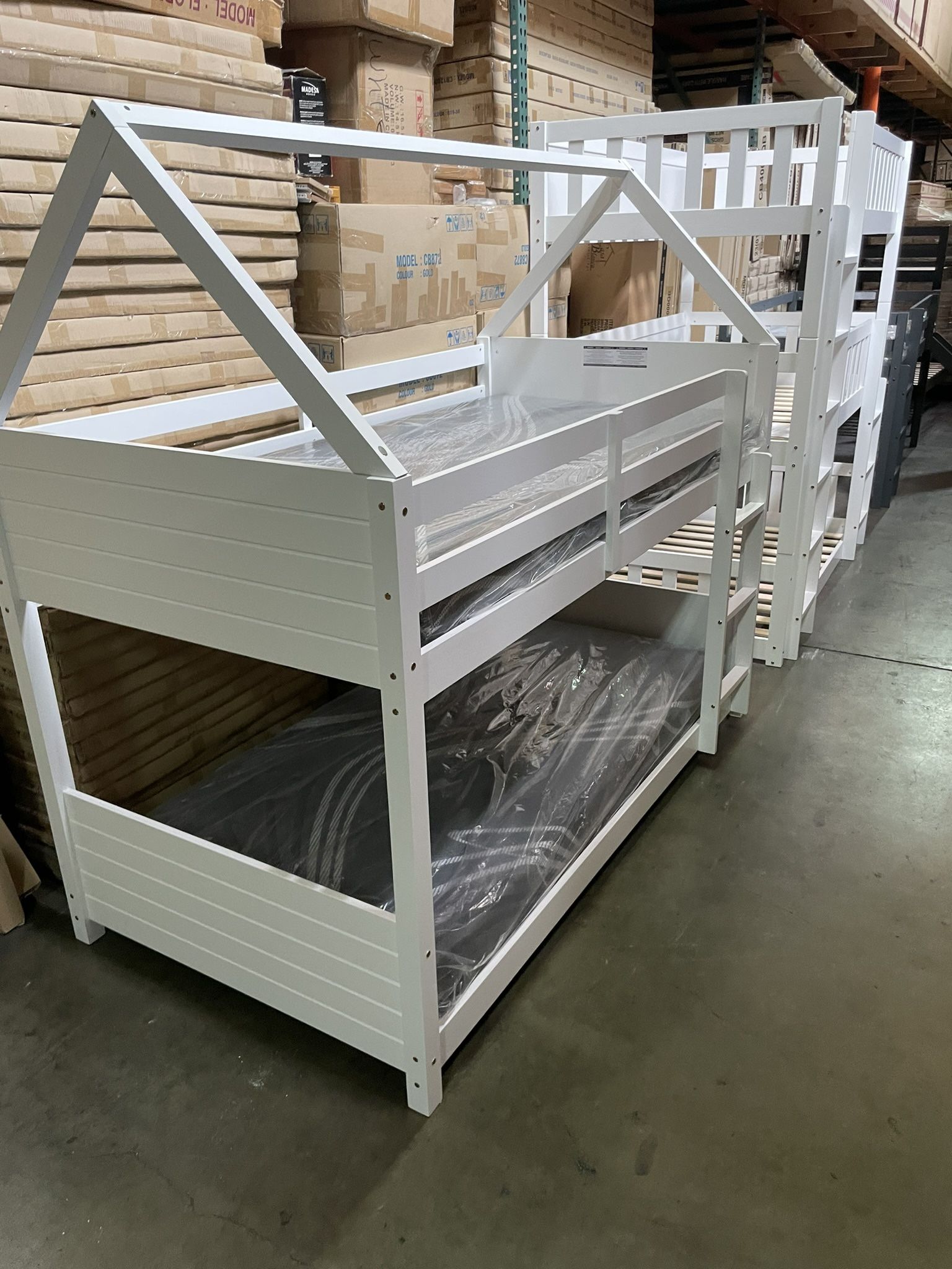 Twin house bunk bed. Available in white&espresso. Assembly required. Assembly not included. Tax included. Free delivery. Bunk bed only-$299 Bunk bed