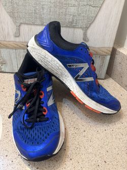 New Balance 1260v7 running shoes in a blue, black, and orange.  US Women’s size 10 or a US Men’s size 9 Need shoe strings.