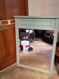 Mirror with wood frame