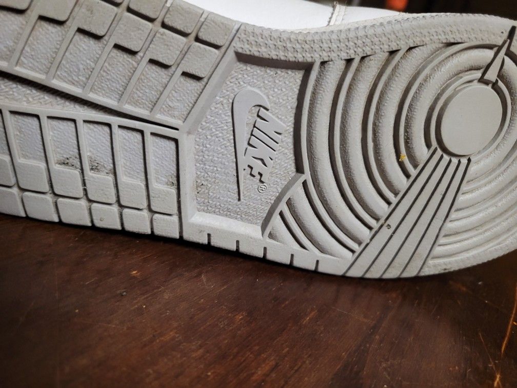 White Nike Air Jordan 1s