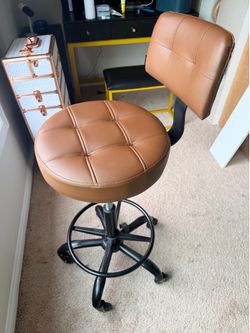 Brown adjustable chair / stool with large wheels