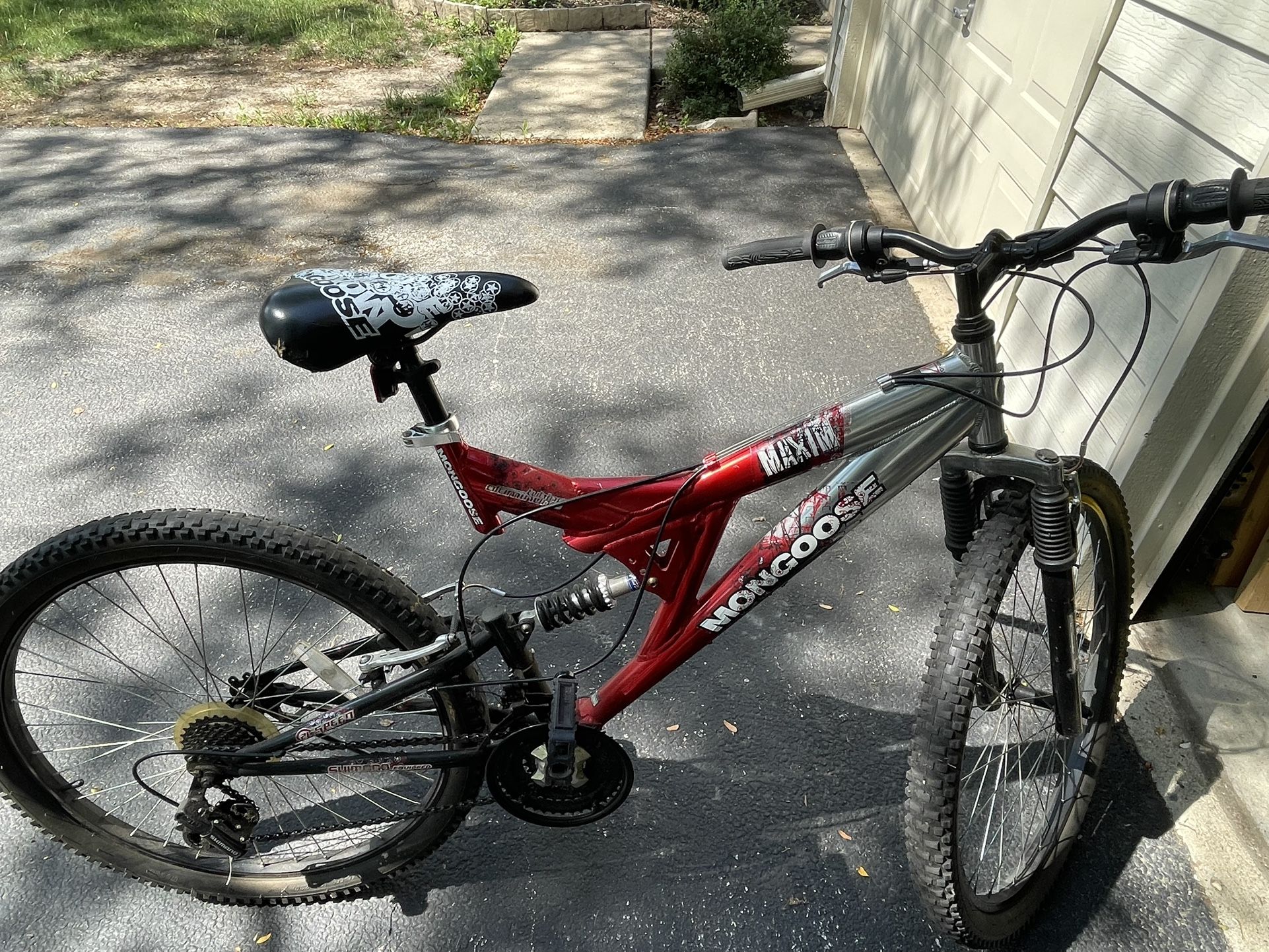 Red and Silver Mongoose Maxim 21 Speed Mountain Bike