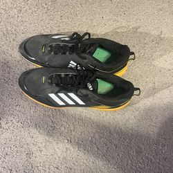 Adidas Icon 7 baseball cleats in black and yellow