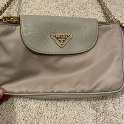 Prada Tessuto Saffiano nylon crossbody bag with a gold chain strap