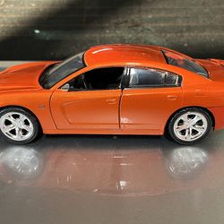 Toy DODGE CHARGER R/T HEMI ORANGE 1/24 DIECAST MODEL CAR BY MOTORMAX 73354