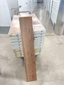 TrafficMaster Laminate Wood Flooring Fawn Pore (23.91 sqft/case)