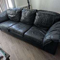 Dark blue leather couch $100