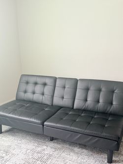 Black couch into bed