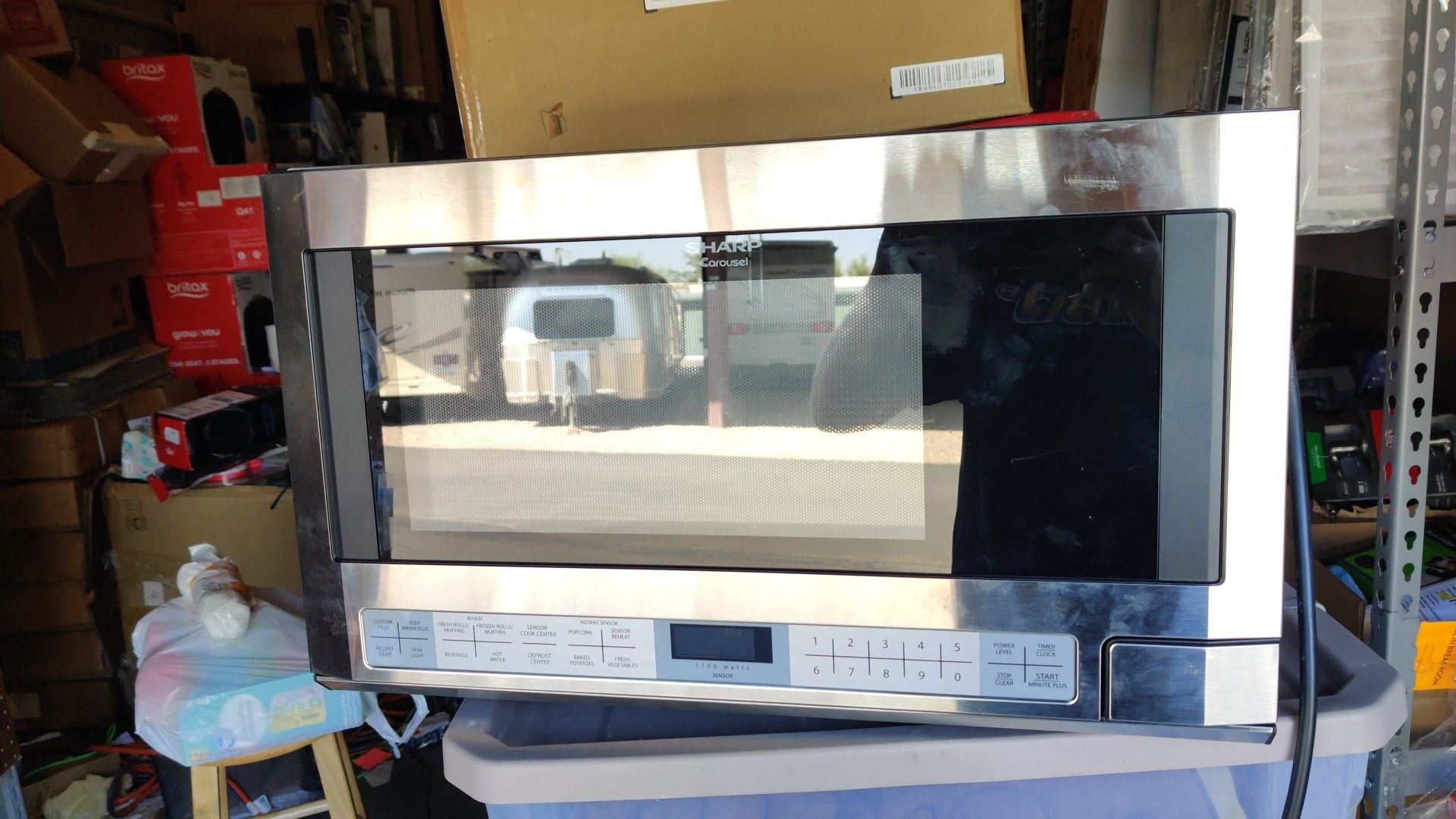 Sharp 1.5 cu. ft. Over the Counter Microwave in Stainless Steel with Sensor Cooking Technology