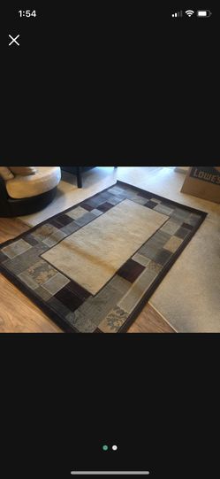 Like New 5ft By 7ft Area Rug $100 Obo
