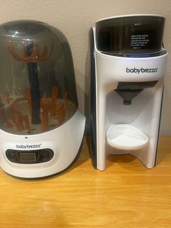 Baby breeza formula dispenser and bottle sterilizer