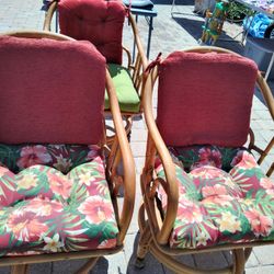 3 RATTAN SWIVEL CHAIRS ON WHEELS 