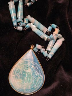 Vintage Mexican Aztec calendar necklace made from carved alabaster or agate sun god pendant necklace