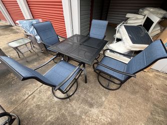 4-Piece Patio Dining Set with Umbrella – $200