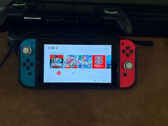 Nintendo Switch —  + 128GB + Extras — $250