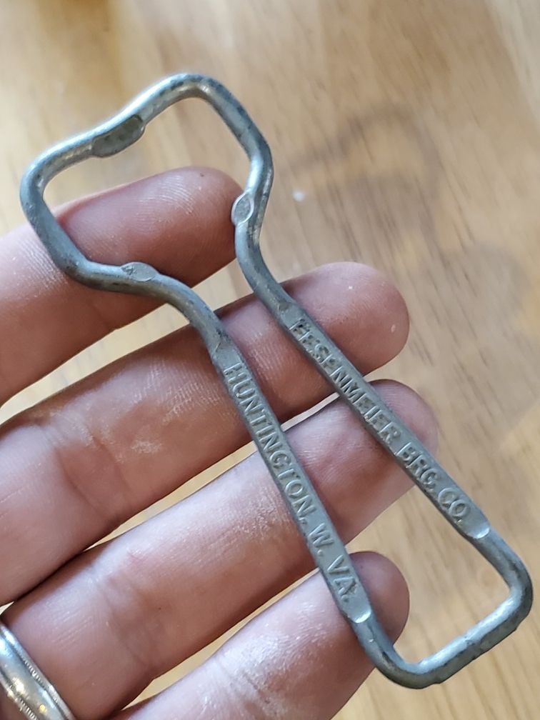 Antique bottle opener W/advertisement (see all pictures)