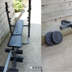 Nice weight set 
Bench 
Barbell 
Curl bar 
2x25 lbs plates standard 
Can deliver
Just bought Olympic Set so selling this one 