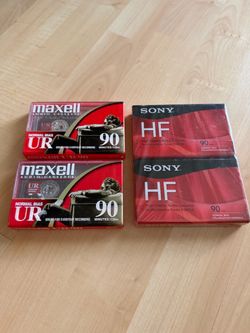 Four brand new blank cassettes